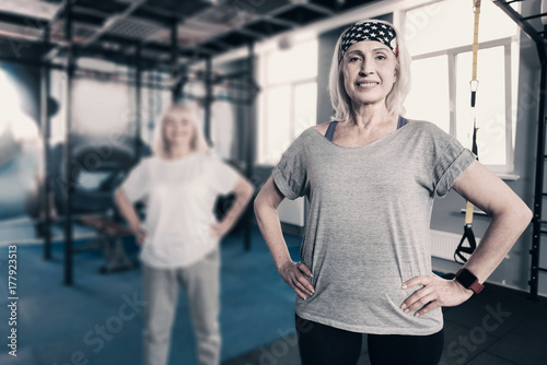 Pleasant female trainer being about to start a workout