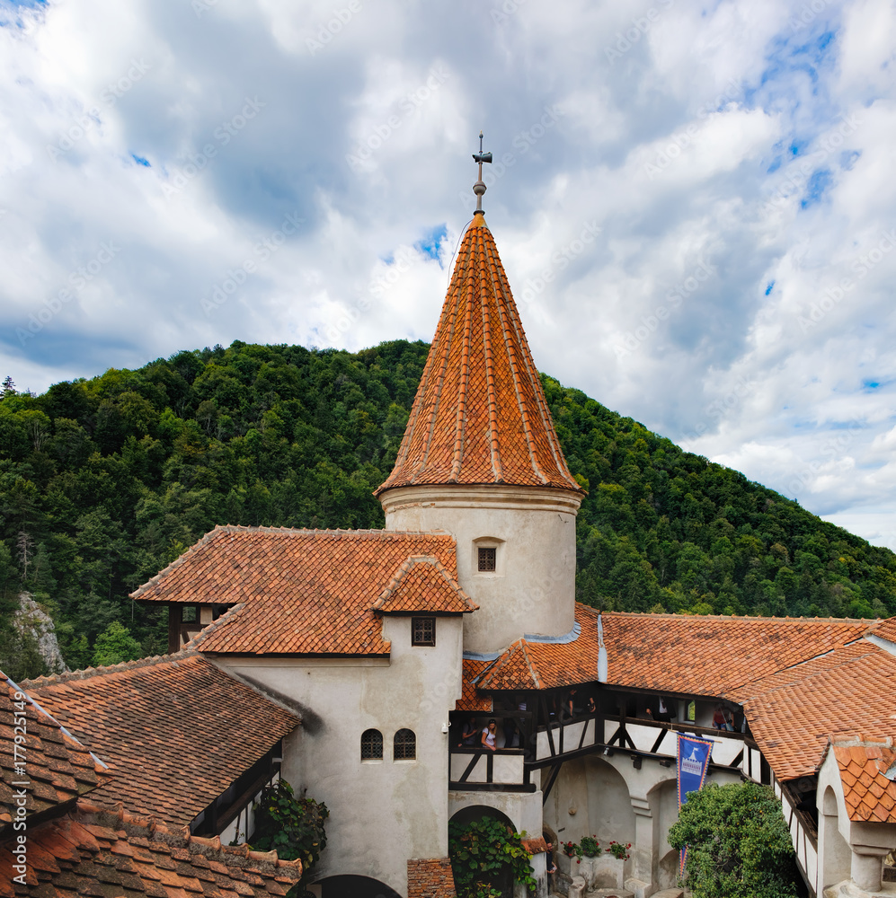 View of inside part of Bran or Dracula Castle in Transylvania, Romania. Tower of medieval Bran Castleor with tourists during the tour