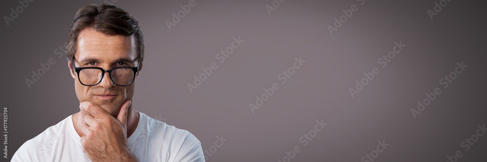 Businessman thinking with glasses and brown background