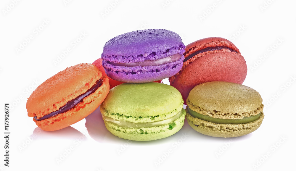 Delicious three multicolored macaroon on a white background Delicious three multicolored macaroon on a white background