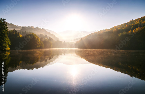 Sunrise on the lake in autumn nature. © Halfpoint