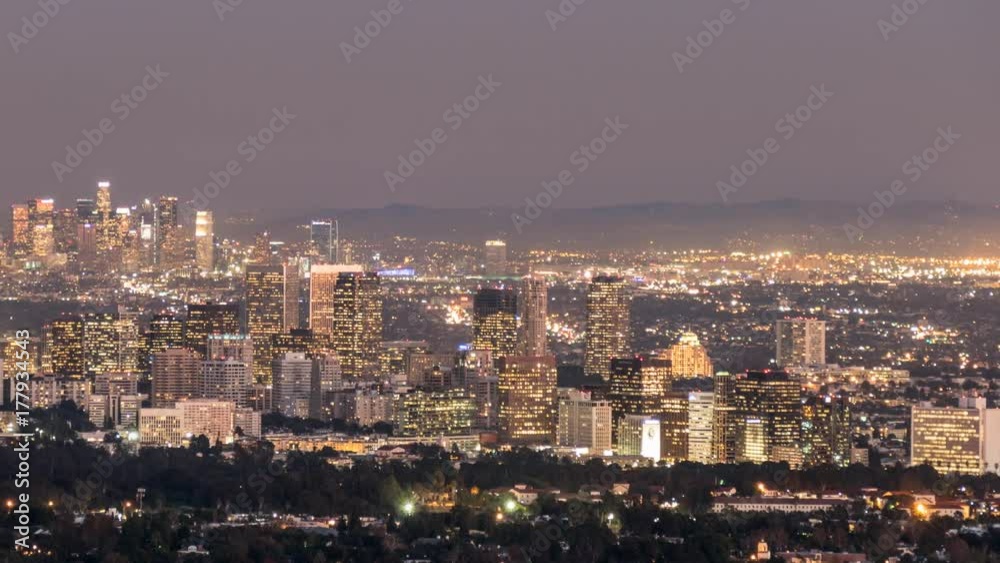 Century City and downtown Los Angeles day to night time lapse with pan. Century City and downtown Los Angeles day to night time lapse with pan.