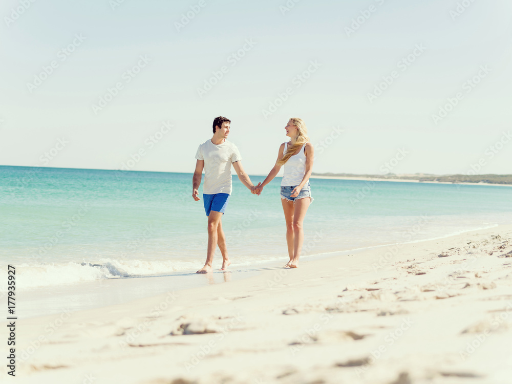 Romantic young couple on the beach