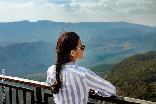 tourist looking at view of Mountains, Montenegro