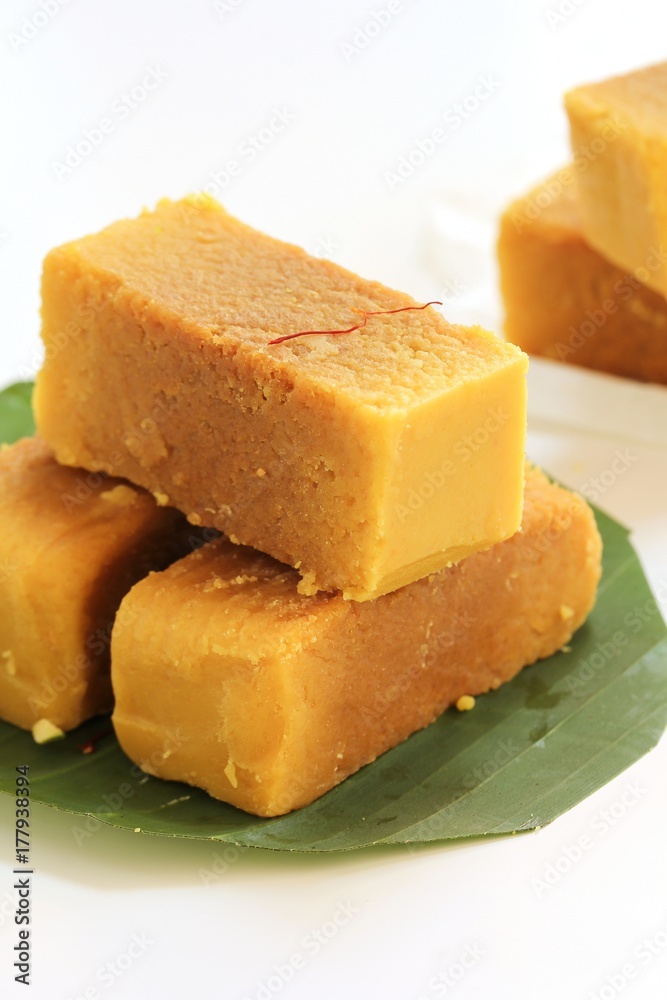 Mysore Pak isolated on white / indian festival sweets Mysore Pak isolated on white / indian festival sweets