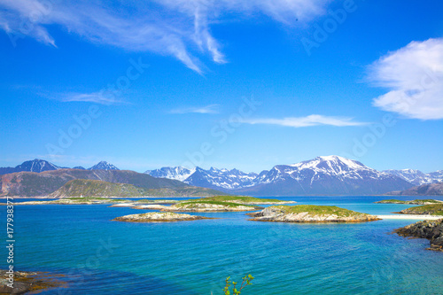 Islands on the background of montains in the north Norway