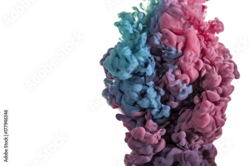  explosion of acrylic colors that create a cloud with soft and random shapes under water. concept of creativity and art.