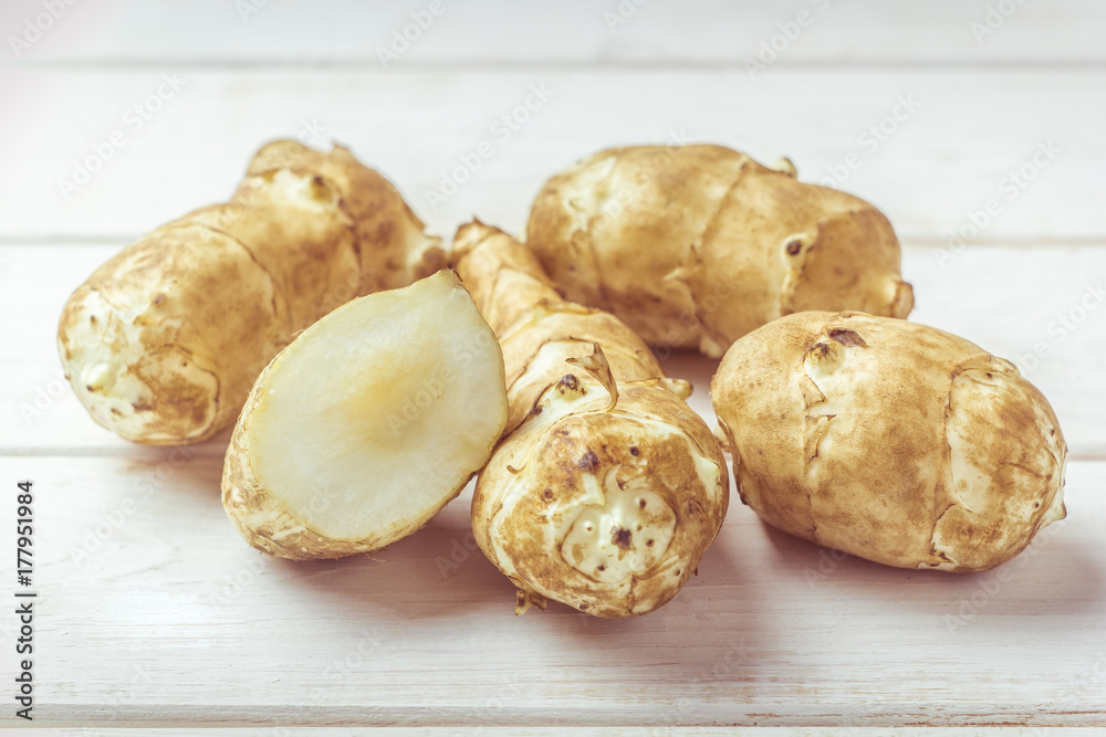 Jerusalem artichoke on a white background. Jerusalem artichoke on a white background.