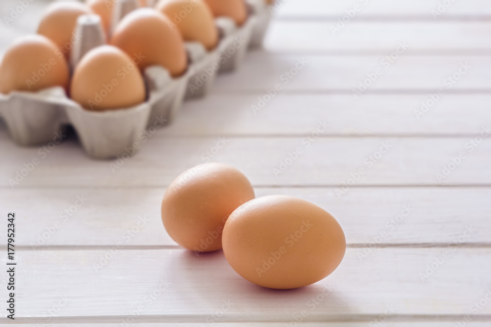 Chicken eggs on a white background. egg tray Chicken eggs on a white background. egg tray