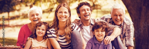 Portrait of smiling family having picnic photo