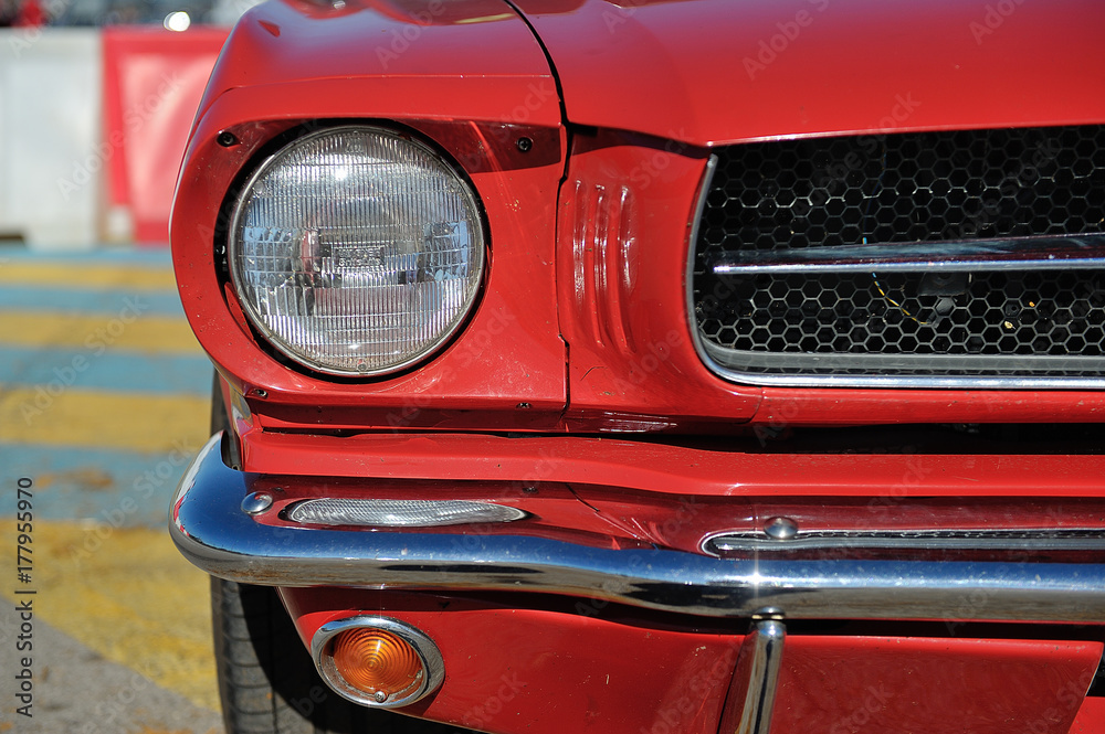 American muscle car. Head light detail