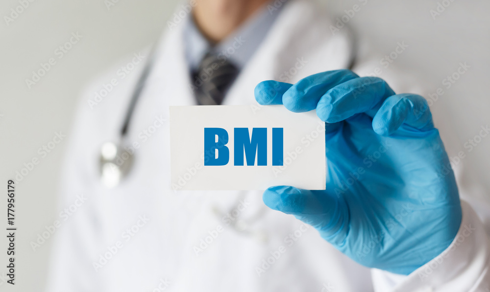 Doctor holding a card with text BMI, medical concept Doctor holding a card with text BMI, medical concept