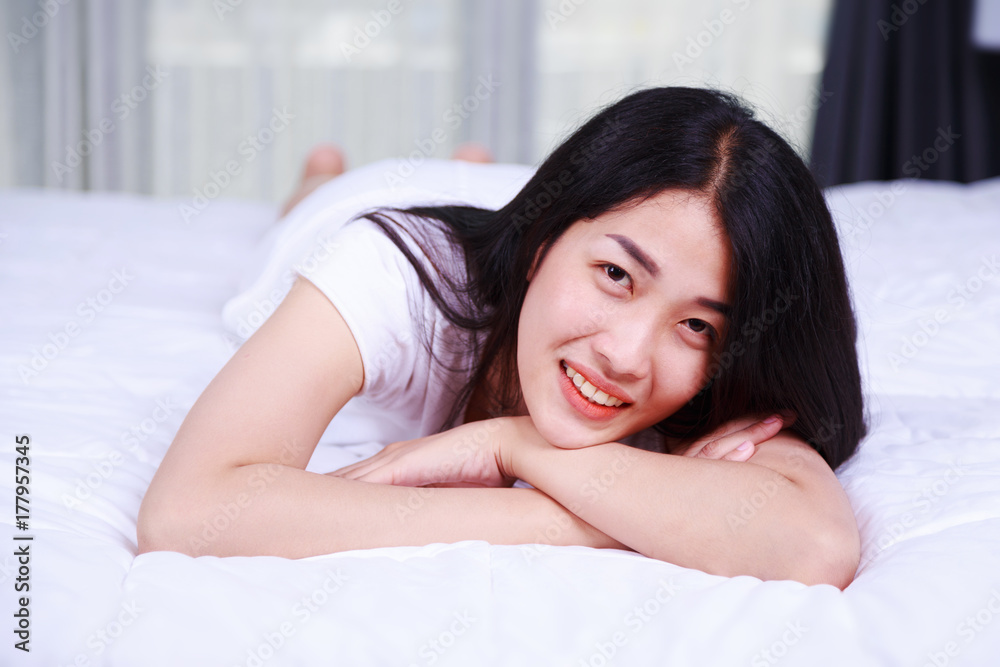 portrait beautiful woman on bed in bedroom portrait beautiful woman on bed in bedroom