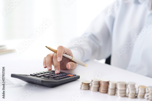 Close up accountant or banker making calculations. Savings,Concept finances and economy