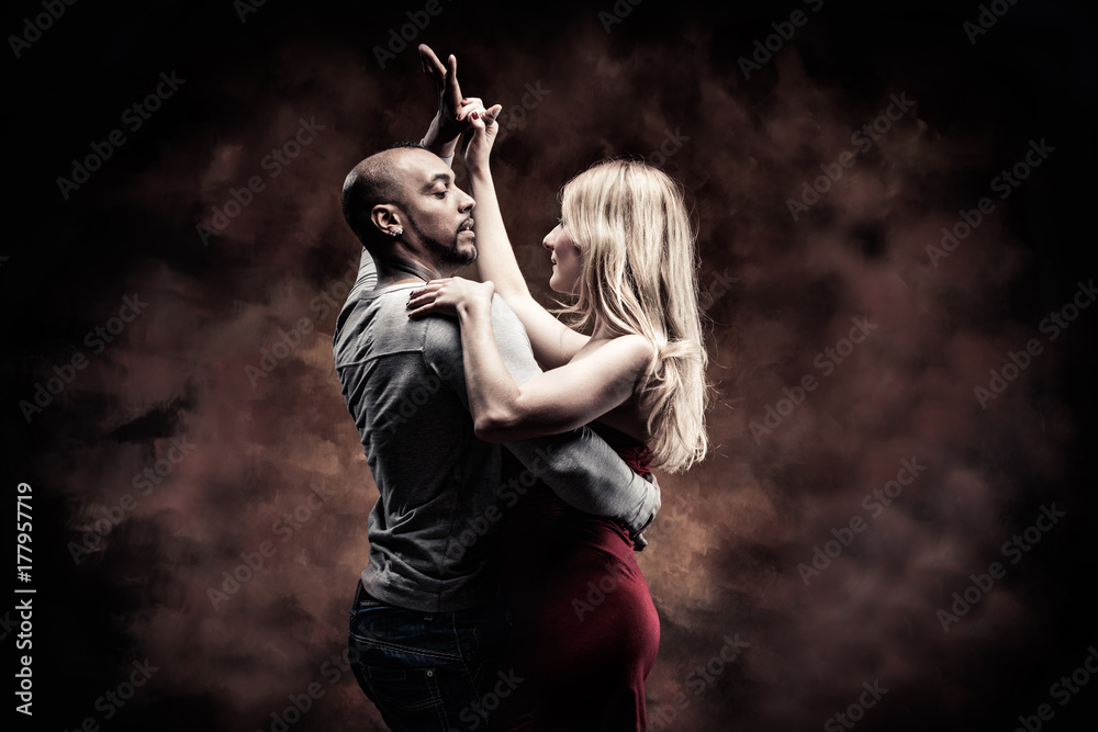 Photography Young couple dances Caribbean Salsa