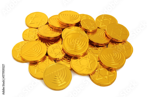 Image of jewish holiday Hanukkah with gold chocolate coins isolated on white photo