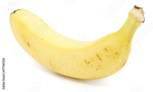 One yellow banana isolated on white background