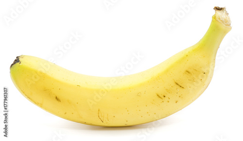 One whole yellow banana isolated on white background