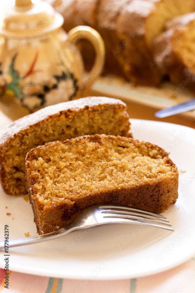 sweet almond homemade cake on white plate with coffee