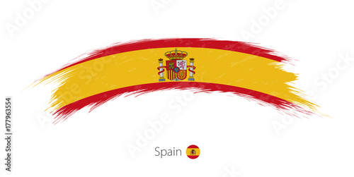 Flag of Spain in rounded grunge brush stroke.