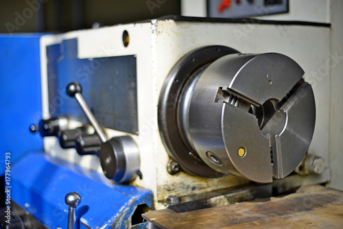 Technicians are turning lathe with horizontal lathe machine.