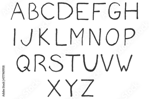 Handwritten black capital letters isolated on white background