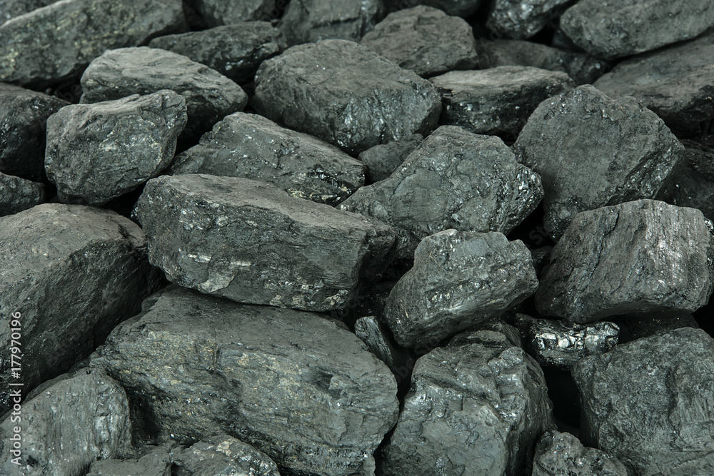 Concept of energy fuel - black coal in close-up as a texture or background Concept of energy fuel - black coal in close-up as a texture or background