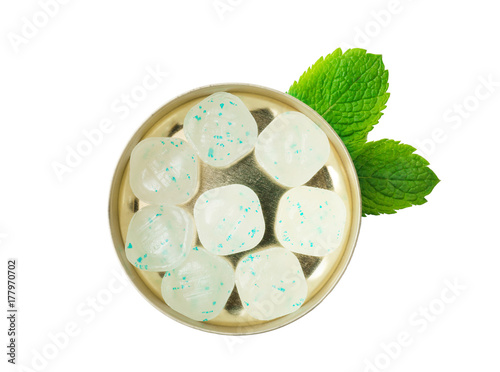 Box with hard mint candies on white background