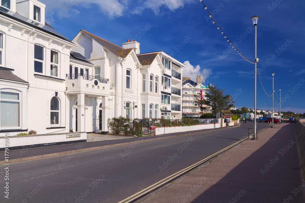 Row of white houses on the coastal street Esplanade. Exmouth. Devon. England