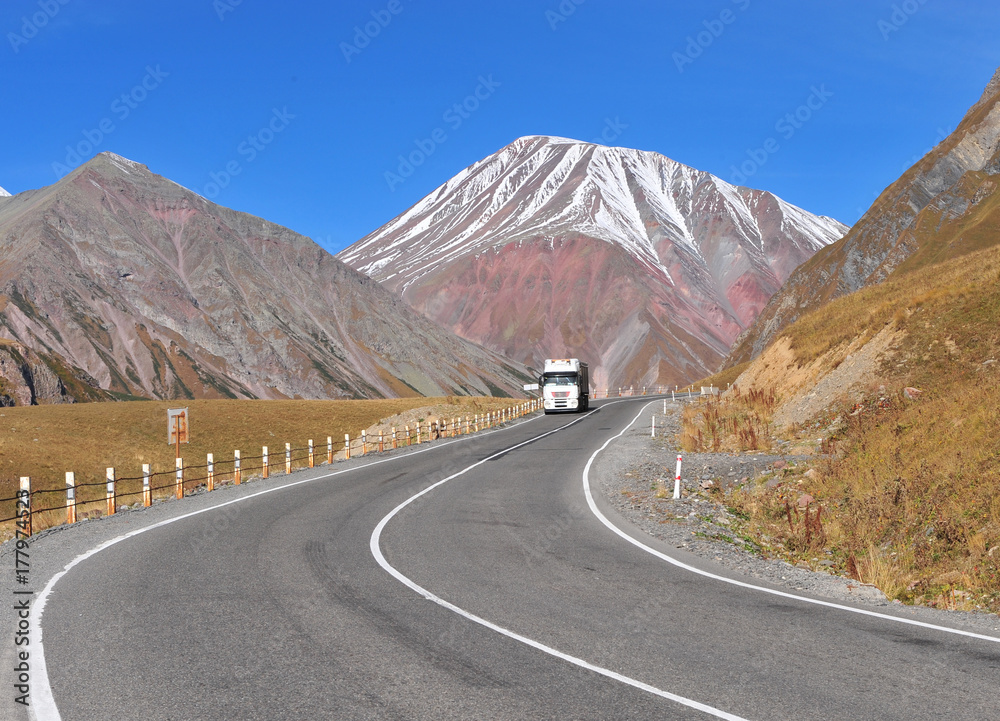 Truck on the highway in mountains