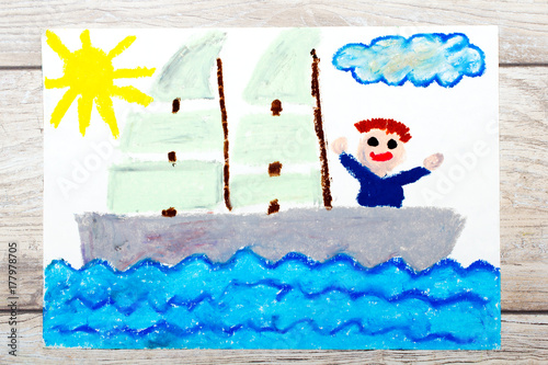 Photo of colorful drawing: Happy boy on a yacht photo