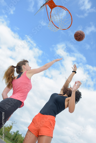 women playing basketball © auremar