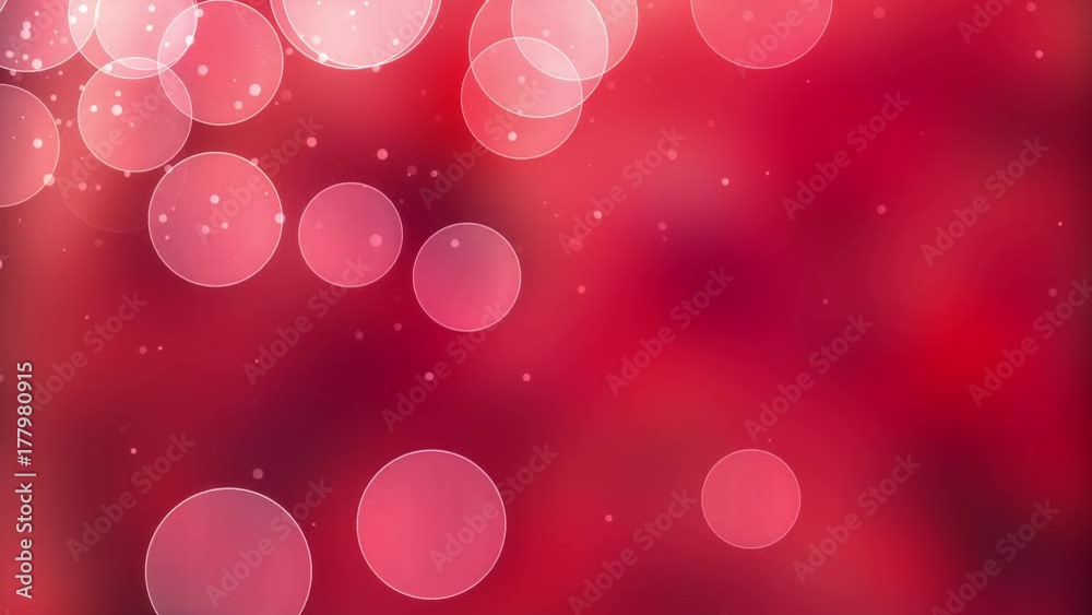 Abstract Red Christmas motion background. Gold sparkles and round glitter bokeh particles and light. New year collection