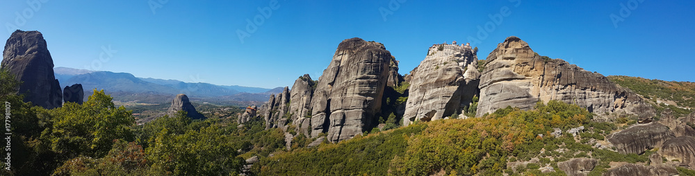 Wide panoramic view of the Meteora rock monasteries in Greece