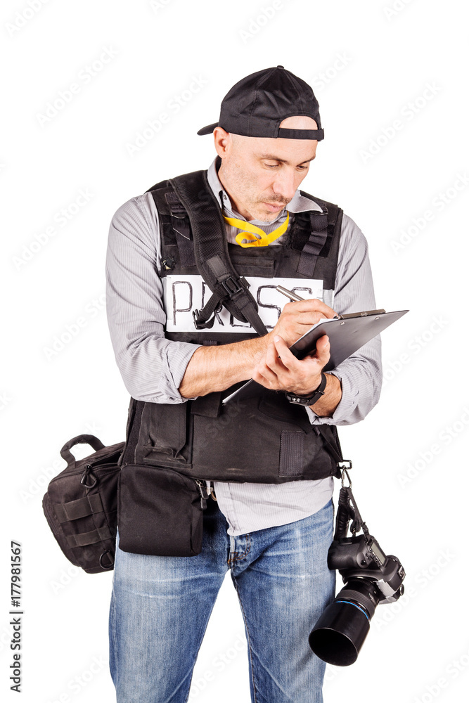 military press photographer with a professional camera. military press photographer with a professional camera.
