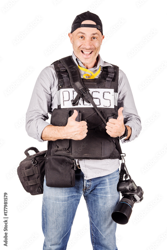 military press photographer with a professional camera. military press photographer with a professional camera.