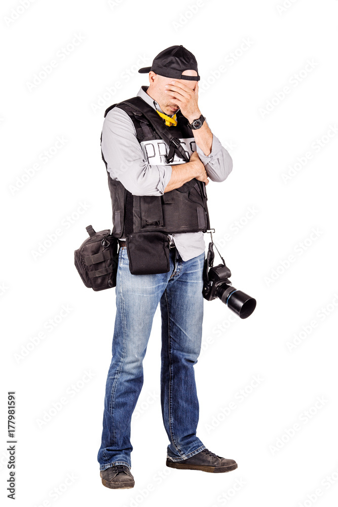 military press photographer with a professional camera. military press photographer with a professional camera.