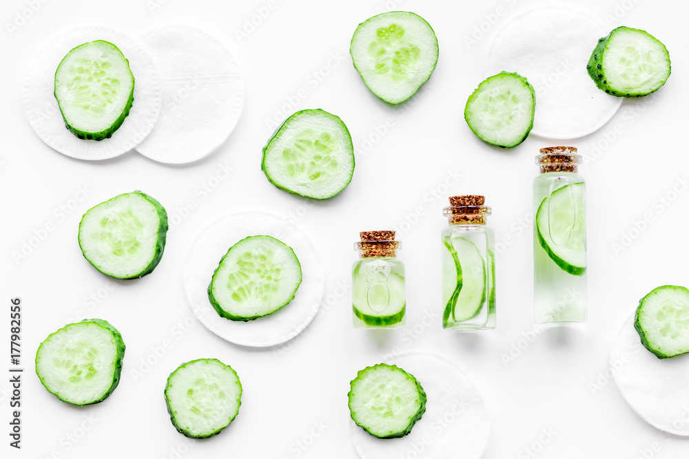 Sliced cucumber for face mask on white background top view Sliced cucumber for face mask on white background top view