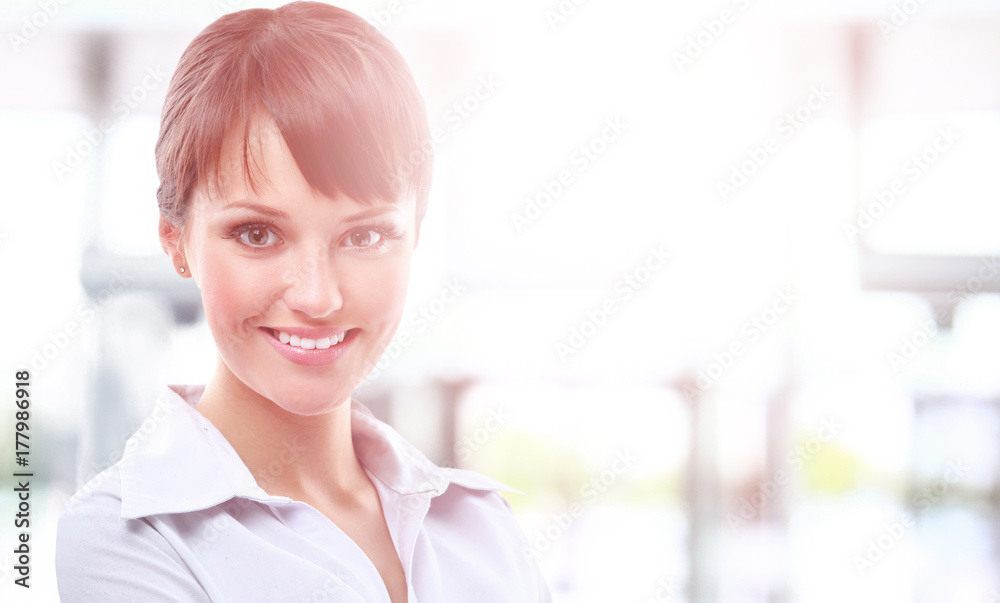 Fototapeta premium Modern business woman in the office with copy space