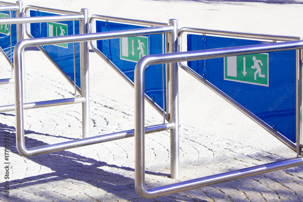 Many entry signats the entrance to the stadium, concert hall. Closed up