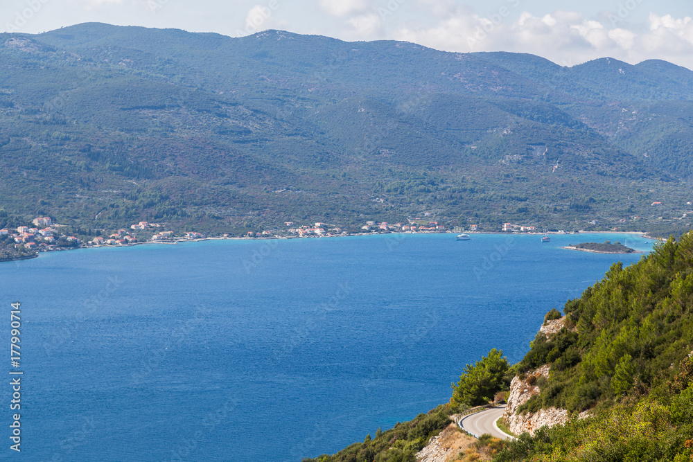 Winding road bends down the slopes of the Peljesac Peninsula