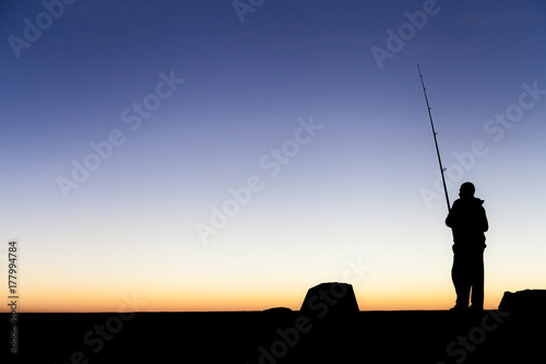 Fisherman silhouette photo