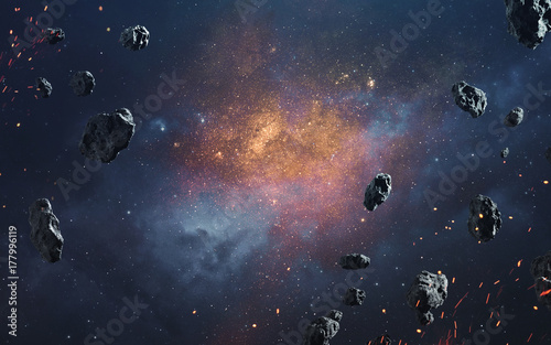 Abstract cosmic background with asteroids and glowing stars. Deep space image, science fiction fantasy in high resolution ideal for wallpaper and print. Elements of this image furnished by NASA photo