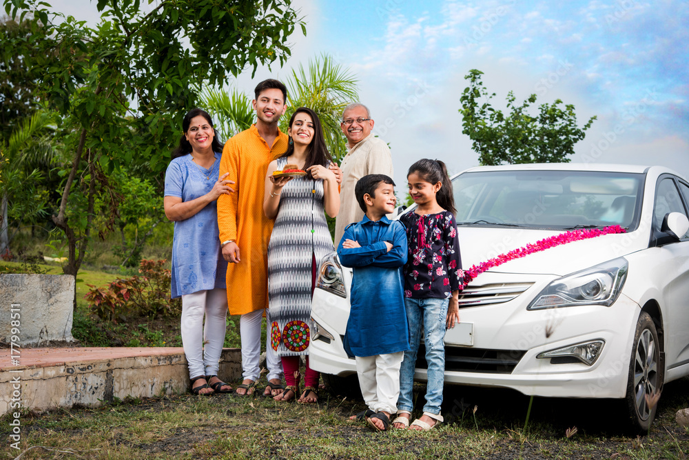 Indian family buying new car Car buying or automobile boom concept in