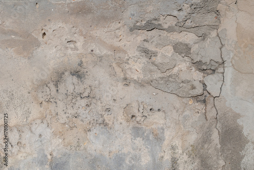old plaster wall, chipped paint, grey texture, background