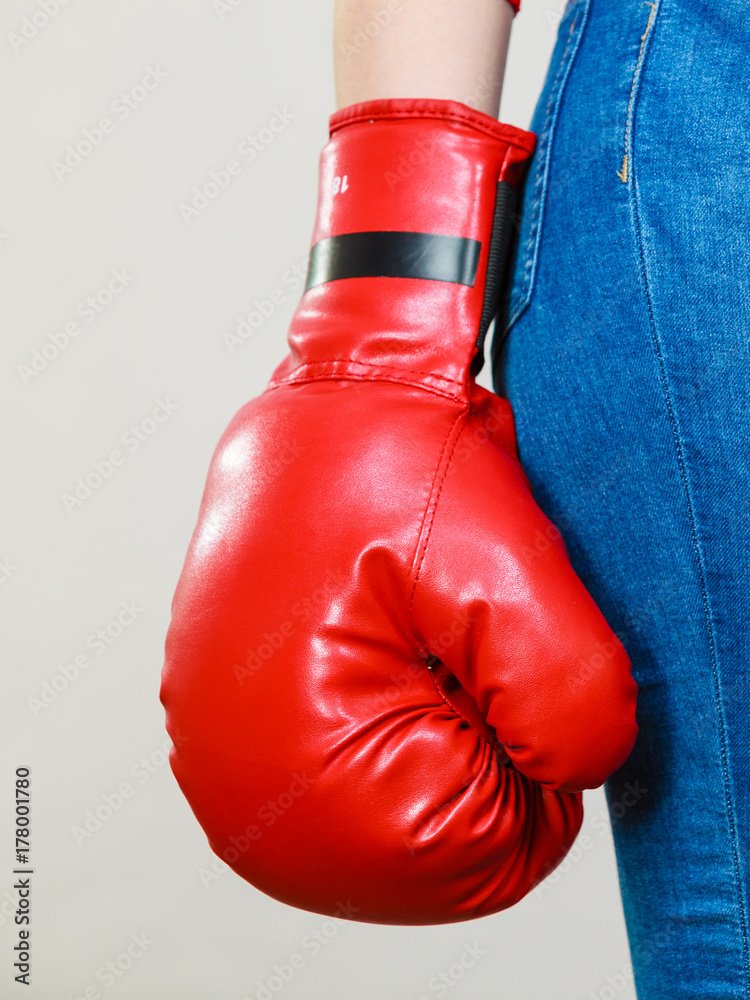Woman wearing boxing glove