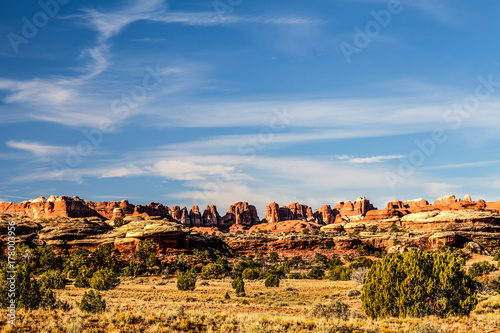The late afternoon sun lights up the beautiful land formations on the Chesler Park Trail in the Needles District of the Canyonlands National Park in Utah.