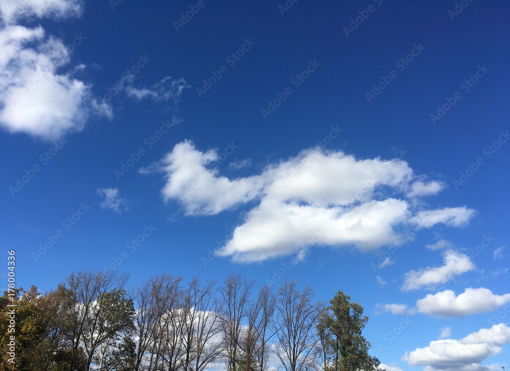 peaceful clouds in fall blue sky peaceful clouds in fall blue sky