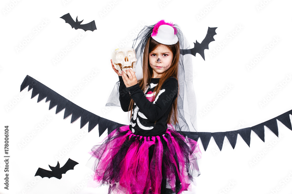 Happy girl in a skeleton costume having fun Happy girl in a skeleton costume having fun