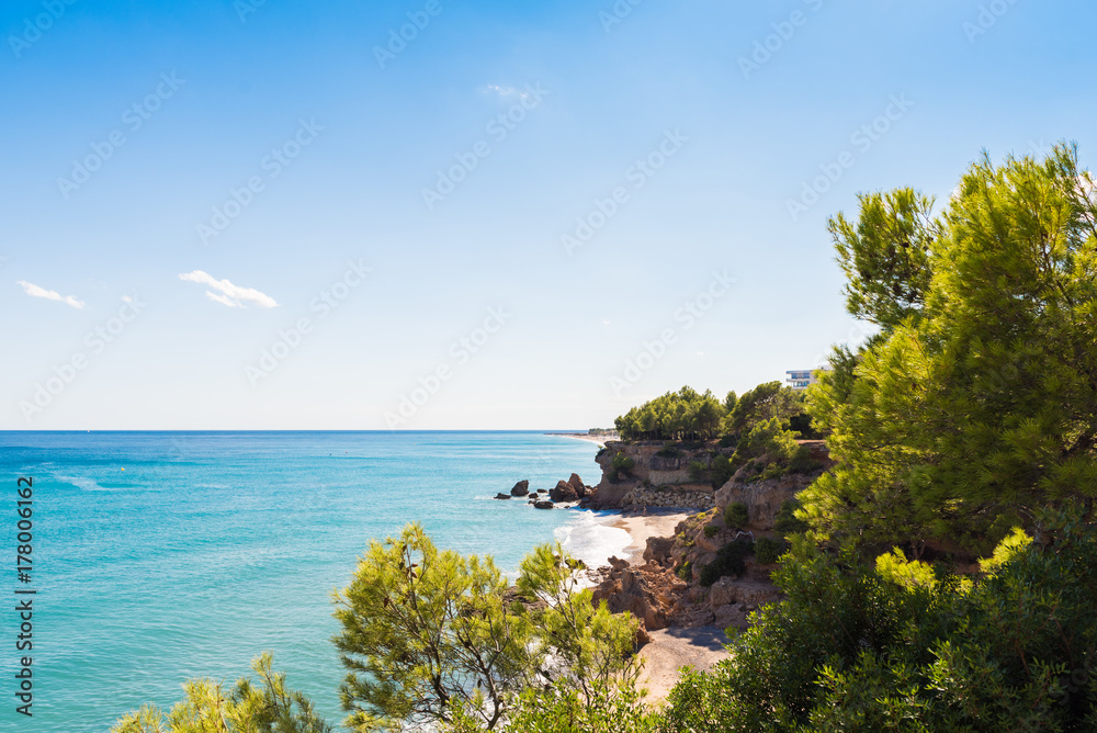 Naklejka premium View of the coastline of the Costa Dorada in Miami Platja, Tarragona, Catalunya, Spain. Copy space for text.